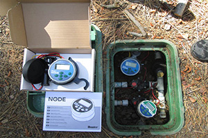 Hunter node controllers installed in sprinkler valve box in Guelph, Ontario